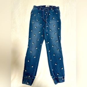 Disney denim joggers featuring Mickey Mouse